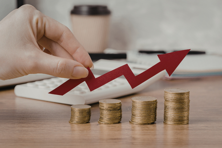 A graphic with an arrow showing an increase in money