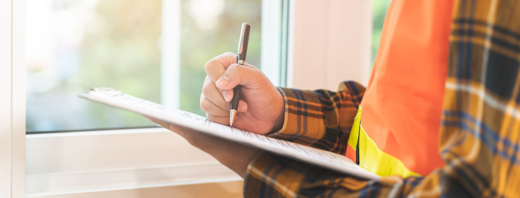 Building inspection, asian contractor young man, male inspecting home, reconstructed construction, renovation or check defect, before finish handing it over to client, customer. Engineering worker.