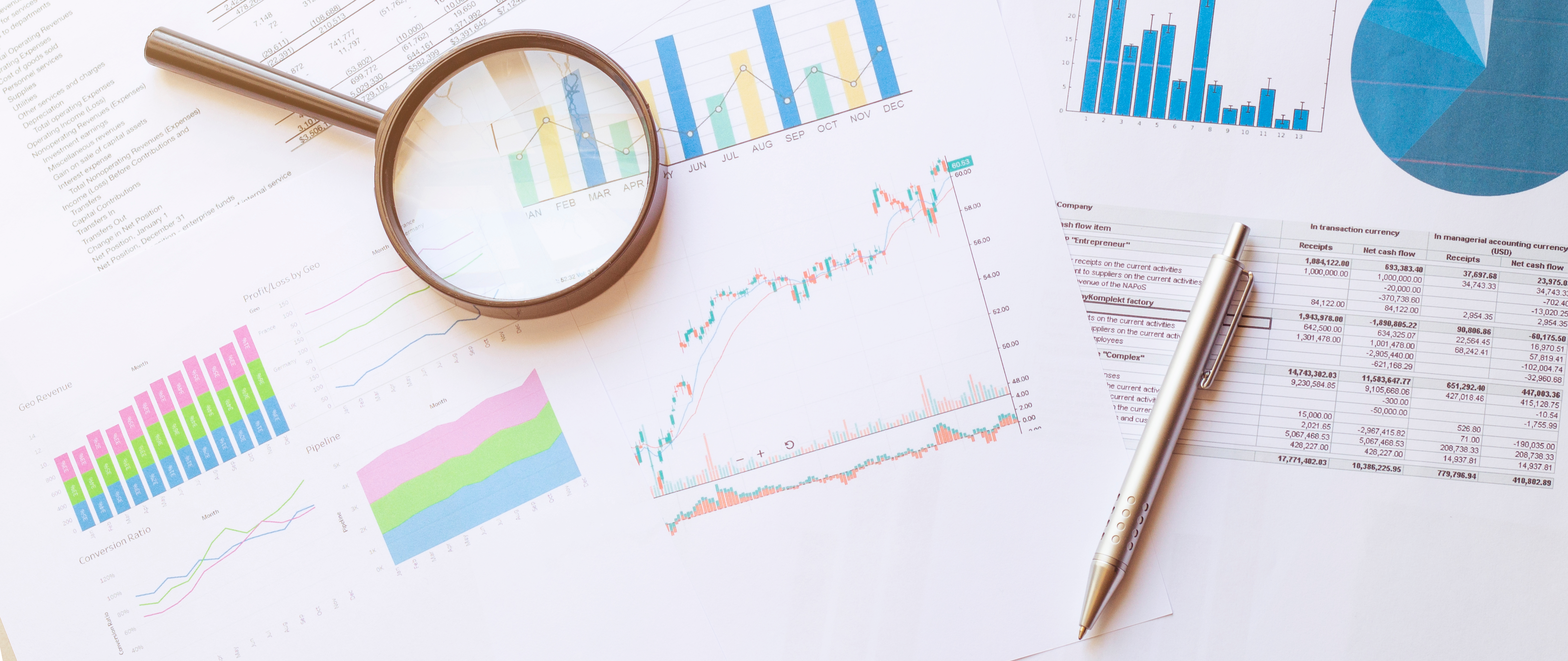 Graphs,,Magnifier,And,Pen.,Analyzing,Finances.